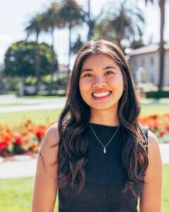 Jasmine Vu wearing black shirt standing on Palm Drive facing away from Mission Church.
