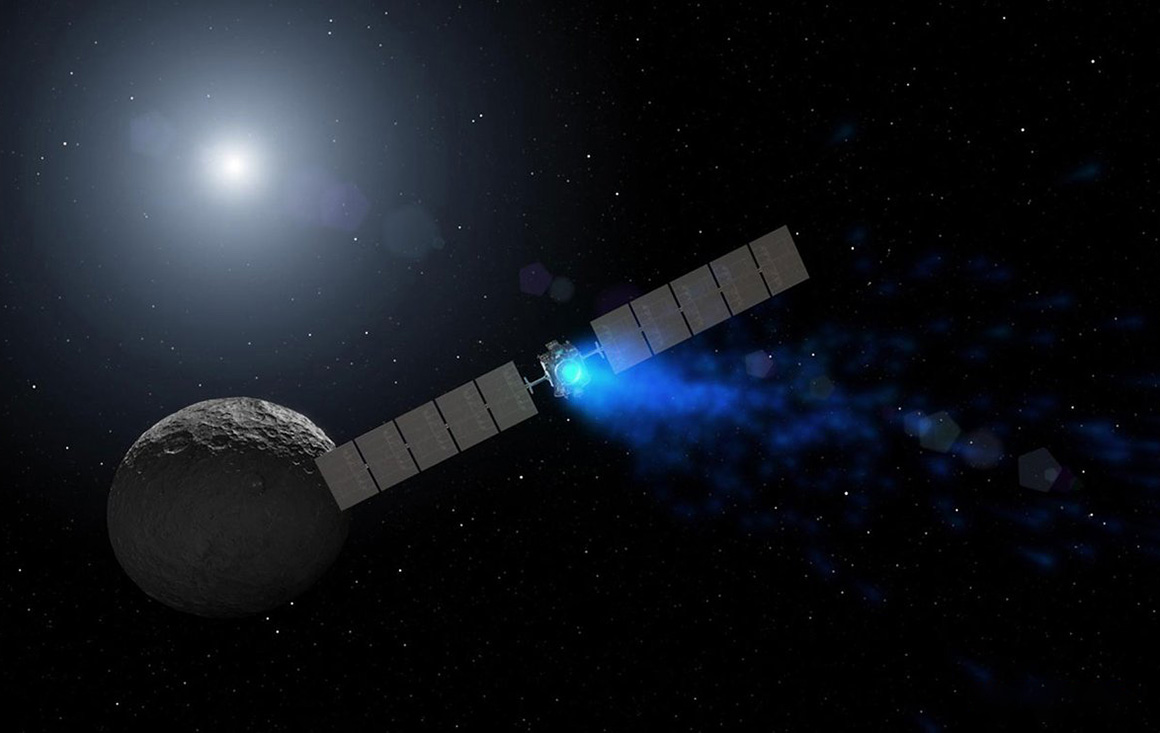 | Artist’s concept of NASA’s Dawn spacecraft orbiting the dwarf planet Ceres.